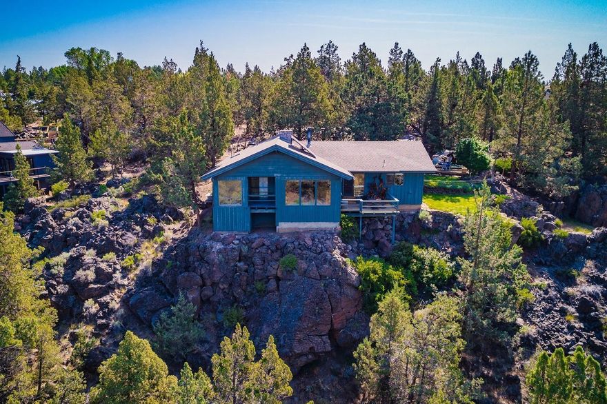 This is a one of a kind, custom home, built directly on the banks of the Deschutes River, with an unobstructed, breathtaking view of the entire Cascade Range! This home has three bedrooms, 2 full bathrooms, a fireplace, granite countertops, solar hot water, detached oversized two-car garage, 2.8 irrigated acres, with a beautiful terraced garden area. Roof less than 8 years old. This is a must see! Call or text to schedule your appointment today!