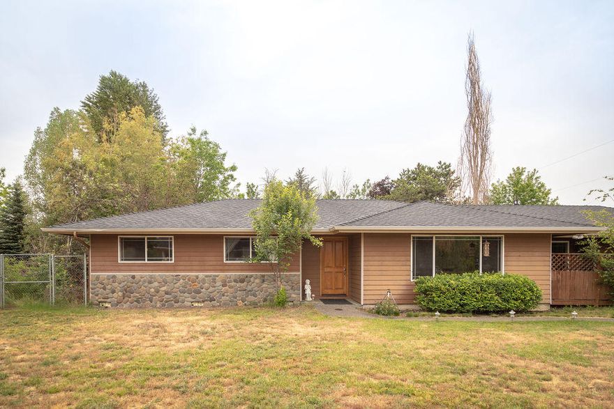 Enjoy your own private oasis in the heart of Bend! This property, surrounded by mature trees on 3 sides, with a relaxing pond will give you the haven you need with the convenience of being right in town! With 4 bedrooms and 2 full baths, an open floor plan, an oversized mudroom, and a detached 2 car garage, this homes checks off all the boxes! Master features a large closet, its own private patio, a separate tub and shower and double vanity. Good separation from master and the other 3 bedrooms. Large bay window and double doors to patio bring lots of light into the dining room and living room.