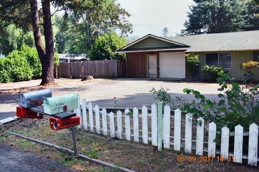 This was a Spectacular Home in it's Day! ...and could be again with your remodeling skills. 2 bedrooms and another bedroom in the converted garage with 2 bathrooms, kitchen and living room. Large 0.4 acre lot with great tree in the back yard. And 2 storage buildings for your hobbies, storage or ???? House is located in the quiet area of Fruitdale Dr below the mountain. The condition is rough, but the price is low, so view it and make an offer....