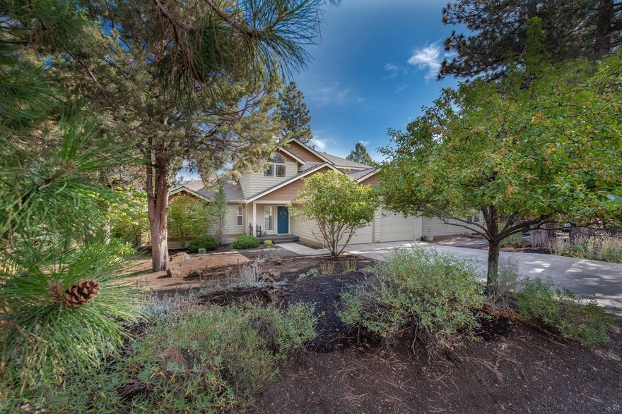 This beautiful light filled home in NW Bend sits on a large, half acre lot that adjoins the neighborhood open space, providing access to the popular Deschutes River Trail. As you enter the home, you are greeted with vaulted ceilings and a wall of windows showcasing amazing easterly views. The kitchen is perfect for cooking and entertaining with beautiful custom wood cabinetry, two drawer dishwashers, a built in refrigerator, a walk in pantry with plenty of storage. The primary bedroom and spa-like bathroom are on the main floor with easy access to the hot tub on the back deck where you can soak up the twinkling city lights on chilly evenings. Upstairs there is a nice loft area/flex space for a home office or workout area and two guest bedrooms with a shared bathroom between them. The 4th bedroom and bathroom are in the attached, permitted ADU on the main level. Come see this beautiful home in NW Bend today!