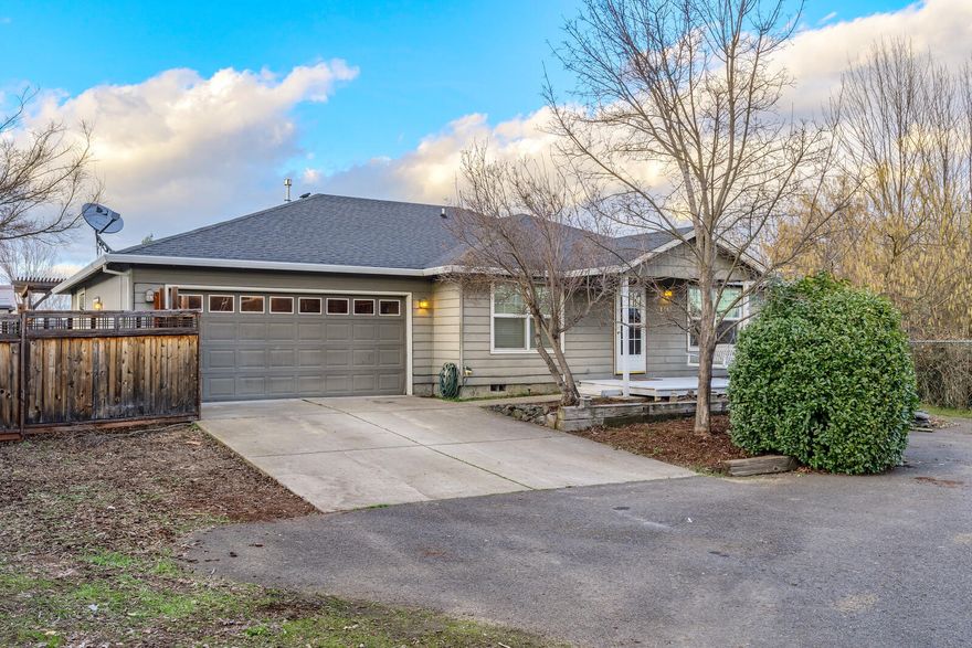 Nice one-owner home in a great neighborhood.  Built by Suncrest Homes in 2001, this creekside home sits back on a flag lot which affords great privacy and a rural feel.  The home has a nice floor plan with a separate living and family rooms.  Kitchen with breakfast bar has newer stainless appliances including side-by-side refrigerator, gas range, and a brand-new KitchenAide dishwasher.  Slider leads to a greenhouse garden room from the family room.  Bedrooms are nicely spaced and separated from the expansive master and there is a nice laundry room.  Deck with built-in spa, two storage sheds, attached two-car garage, and enough parking for an RV.  New carpeting throughout.