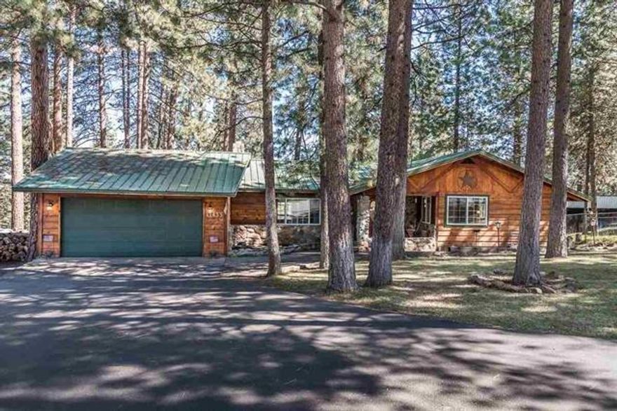 Move in ready! This home offers large bright rooms, a family room, formal dining, a fireplace, attached 2-car garage and almost everything else on your wish list! Do you love the outdoors? The home is nestled among tall, majestic pines where the light softly cascades through the trees. This 3br/2ba home has an unassuming charm that complements the environment. It is a definite must-see home which offers gracious living at a very affordable price! The home has newer custom cabinets by James Borror with pull out shelving, granite countertops ,a pantry, gas forced air heating and air conditioning, a newer metal roof, and inground sprinklers front & back. This home truly stands out. Call us today for more details!