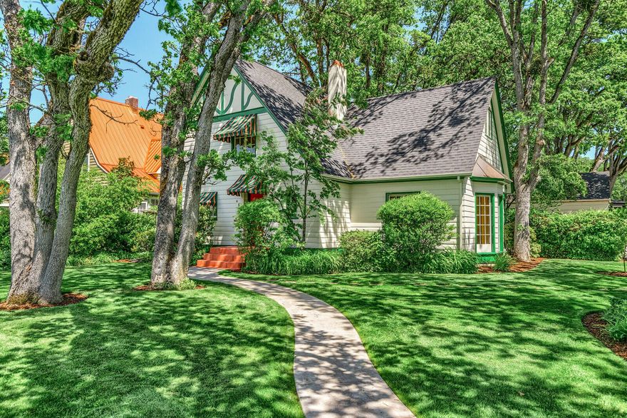 One of Old East Medford's most charming period homes!  All of the appeal of a 1929 English Cottage with updated features make this home one not to be missed!  Beautiful woodwork, hardwood floors, unique arched doorways, casement windows, period light fixtures, French doors throughout, and just too much to mention!  Updated kitchen, formal dining room, living room with vaulted ceiling and beautiful tiled fireplace, sun room, and powder room/laundry on the first floor.  Upstairs there are three bedrooms and a period bath.  There is a partial basement for storage and a two-car garage.  Private back yard and beautiful mature landscaping, secluded patio, wysteria-covered pergola, and raised beds for gardening.  Recently painted on the outside and a lot of other work has been done.