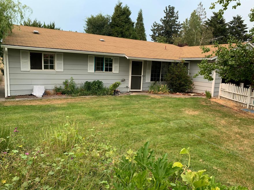 Make this home yours! This 3 bedroom 1.5 bath home with family room sits on a large flag lot off of a dead end street. New exterior paint. Plenty of room for your
vegetable garden and flower beds. Nice covered patio for backyard barbeques. Plenty of parking area for RV or boat. Large shed for all your tools or extra storage. This
home won't last.