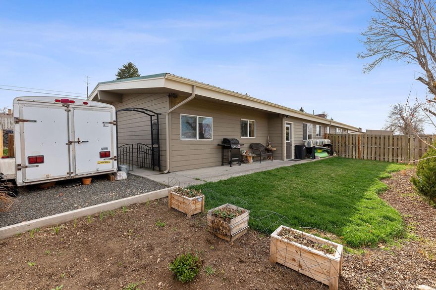 Don't miss this fantastic investment opportunity! This well-maintained duplex offers stunning sunset views, with a picturesque backdrop of the mountains and historic train trestle right out front. Each unit features spacious living, updated finishes, and a bright, open layout. Larger side is a 3 bedroom 1 bath the other side is a 2 bedroom 1 bath. Outside, enjoy a fully fenced yard, a storage shed, and plenty of off-street parking. The property sits on a generous lot with room to roam, and is conveniently located near schools, parks, and downtown amenities. Whether you're looking to live in one side and rent the other or expand your investment portfolio, this property checks all the boxes!
This lot is .30 buyer to due diligence with the city on an ADU or building another home or duplex.