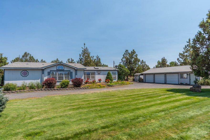 Grand Cascade Mountain Views from this beautiful 4.34 acres with 2 acres of irrigated fenced pasture, dry pasture, pond, 3 stalls & tack room. This horse property is ready to go! Well cared for home with vaulted ceilings, large master suite equipped with 2 walk-in closets, shower & jetted tub. Spacious floor plan creates large living room, skylights in the kitchen, utility room & access to huge private rear deck. Pull through driveway plus detached 3 car garage with additional heated workshop.