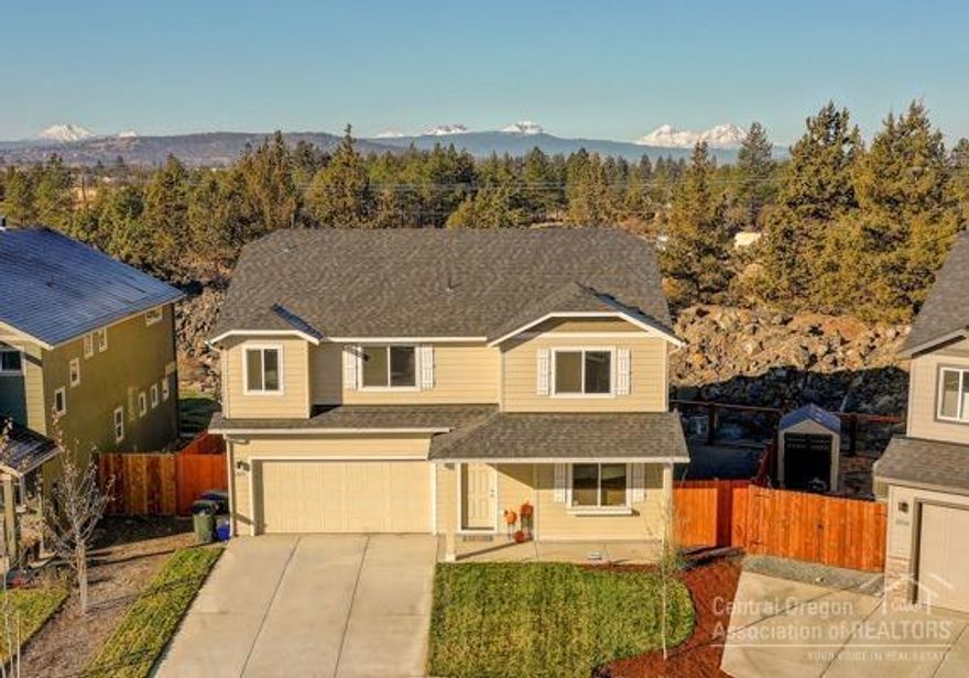 Like-New 2200sf Home with Privacy Plus! This charming 2017 built 4Bed + Office/2.5Bath home backs the canal for extra privacy of no backyard neighbors and features covered front porch, tiled entry, great room w/Gas FP, open dining/kitchen w/wood laminate flooring, slab Quartz counters, Stainless-Steel appliances, large pantry, spacious master suite w/Cascade Mountain views, walk-in closet, large private bath w/tiled floor, double vanity, shower stall + soaking tub w/tiled accents, 3-additional large bedrooms, laundry room w/tiled floor, wash basin & newer Washer/Dryer, security system, high efficient separate 2-zone (upstairs/downstairs) Gas FA Heating & Central AC system, attached double car garage - finished/insulated, very private/fully fenced backyard w/oversized covered patio!