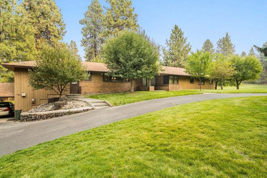 Great opportunity to own a small acreage property that is centrally located in Bend. This well manicured 3.25 acre property features a nice single level 4 bedroom/3 bath home (3,232 SF). There is an outbuilding of approx. 1,152 SF as well as an older tennis court and in ground swimming pool (currently drained). This property could be held for future redevelopment as well. (An additional 6.73 acres of RS zoned land as well as this property are listed. See listing 220151225).
