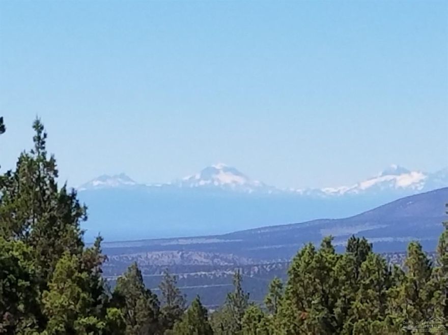 This elevated, gentle sloping, north facing 2.06 acre treed lot has fantastic north valley, Ochoco and Cascade Mountain views. Great opportunity to own a small parcel in a quiet, private country location near Prineville Reservoir and BLM. Perfect for star gazing and bird watching.