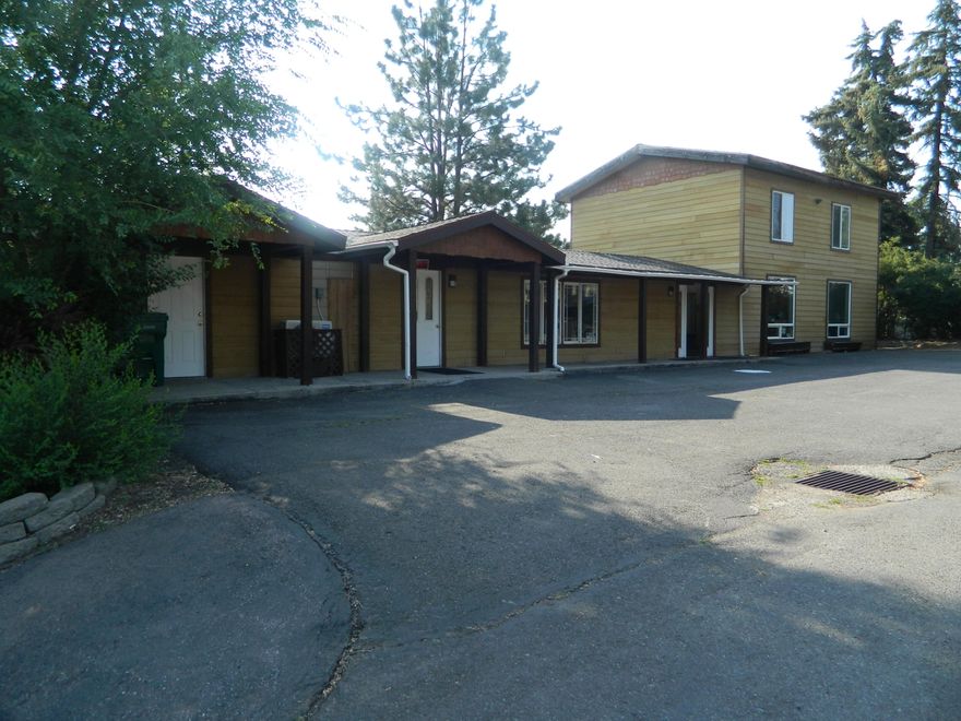 Here is a great commercial building already set up for a variety of medical professions. There are currently 8 exam rooms and a few more that can be modified to add more exam rooms and a gym area for physical Therapy. The reception area is spacious and has a great receptionist desk area as well. There is 2 separate office areas for administration and a break room area. There is enough off-street parking to accommodate at least 10 vehicles. This building has been well maintained and probably only need personal touches to fit your taste or just move in and start business as usual.