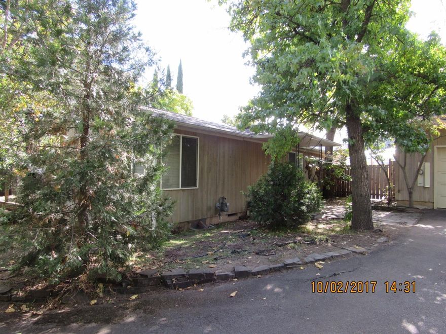 Ashland home with unlimited potential. Includes a detached ADU, and a sleeping room/studio over the garage.