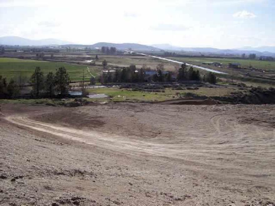 Impressive View Lot In Henley Area Overlooking Lost River And Klamath Basin. Homesite Cut & Driveway Prepped. Level Area Below Drive For Sand Filter And Shop Or Barn Area. Boundry Markers Are Yellow Taped.