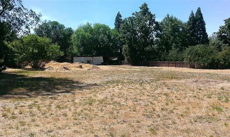 Property consists of flat commercially zoned build-able parcels facing one of the busiest streets in Ashland across from Wendy's. Parcels previously had a mobile home park and all utilities are still in ground. In 2006, the city of Ashland approved a mixed use residential condominium complex with commercial spaces on the ground floor. This project's approval expired in 2009 and construction never started. Fantastic valley views are a potential should new development consist of 2 to 3 stories. One of the last develop-able parcels located on the South side pf Ashland. Close to other commercial centers. Contact broker for more details. Broker is related to sellers.