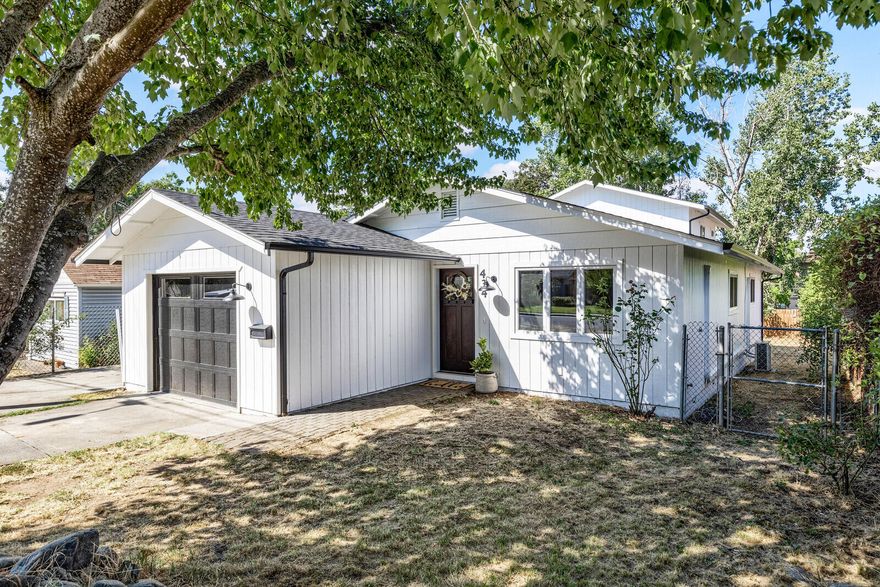 You'll love this exceptional recently renovated home, conveniently located in a quiet neighborhood in Grants Pass. Close to district 7 schools, shopping, hospital, and parks. 
This stunning 4-bedroom, 2.5 bath home features an open kitchen that would be great for entertaining with new granite counter tops, beautiful wood cabinetry, large butcher block island, new stainless-steel appliances and a charming farmhouse sink. Right off the kitchen you'll find french doors that take you to the marvelous deck. This kitchen was designed for convenience.
The bright open floorplan of this home gives you 1994 sq. ft. of spacious charm, a bonus room, new canned lights and new luxury vinyl plank flooring throughout.
Each bathroom in this home has been completely remodeled with no detail spared. New vanities, spectacular tile work, upgraded glass shower doors and updated light fixtures.
This home has so much to offer, hurry before it's too late!