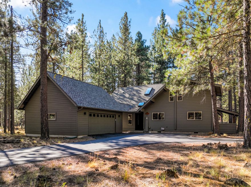 Discover one of Black Butte Ranch's best buys. Perfectly situated between the South Meadow Pool Complex and the Glaze Meadow Recreation Facility, this thoughtfully designed residence combines comfort, style, and location. The main-level primary suite, chef's kitchen, and vaulted great room with wood stove create a warm and inviting retreat. With four bedrooms, three baths, an office, and expansive outdoor entertaining deck, there's room for everyone to relax and connect. Recent improvements—including an oversized garage and paved driveway—make this property an exceptional find in one of Central Oregon's most beloved resort communities.