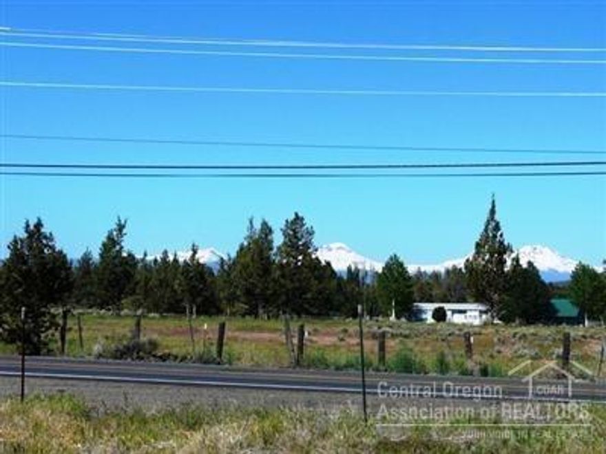 Very nice flat buildable lot with Cascade mountain views! Overlooking farmland. Build your custom home on this one acre lot or develop and build multifamily unit.