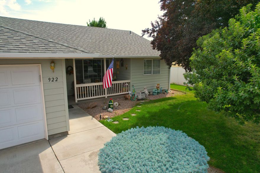 Welcome to your new home in the popular community of North Ridge! This 1,274 sqft, 3Bed, 2Bath home features beautiful, mature landscaping in both the front and back yards. From the covered front porch, you will enter into the great room with vaulted ceilings and an open floorplan to the kitchen and dining area. Split bedroom floorplan allows the primary suite privacy from the two guest bedrooms. The large tree in the front yard provides plenty of shade for the covered front porch and produces plums seasonally. The back yard is fully fenced for your pets and includes 2 sheds for your hobbies and plenty of storage. Shed on the West side of home is equipped with power. Upgraded LVP flooring in great room, dining area and hallway. Upgraded Corian countertops in kitchen. This is one of the most popular floorplans in North Ridge. Seller will include 1 year Home Warranty. Call your favorite Realtor to schedule a showing!!