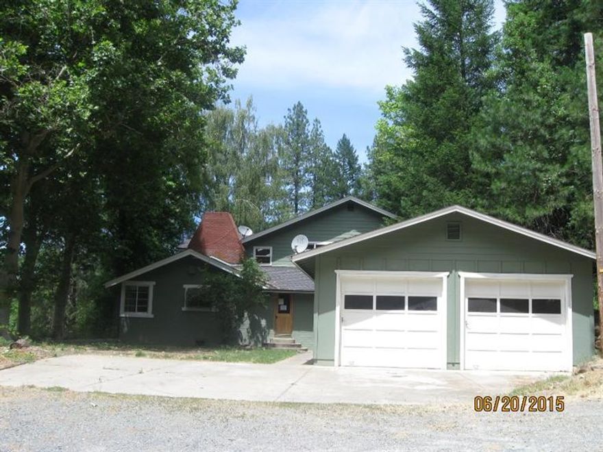 Large home in gorgeous rural setting complete with separate guest quarters, shop, and animal pen. 5 bedrooms, 2 full baths, open living area with loft and fireplace, large utility room and spacious kitchen. New interior paint and carpet, vinyl, new decking, move in ready condition! Seller offers buyer credit up to $500 for home warranty on owner occupied purchases.