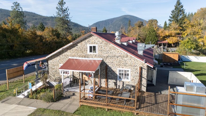 Established Bar & Grill with Historic Charm and Modern Updates!
Don't miss this incredible opportunity to own an established bar and grill in a historic tavern complete with a 2-bedroom apartment upstairs—perfect for owner occupancy or additional income. The property blends timeless character with modern upgrades, featuring updated electrical and plumbing, a newly remodeled commercial kitchen, and renovated bathrooms.

Enjoy the inviting stone fireplace, walk-in cooler, taps and accessories. Additional highlights include city water, ample parking, and a beautifully landscaped, private fenced area in the rear—ideal for outdoor dining or events.

A truly unique property with huge potential—ready for your vision and business ideas!