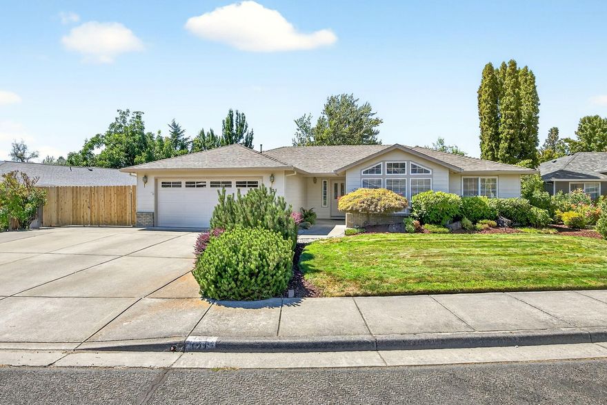 Quality built Pac Trend Good Cents home in highly desirable Phoenix Hills. This move in ready gem offers lovely views of the eastern hills & is packed w/big ticket updates. New HVAC w/10 yr warranty, newer roof (2018), new garage door & opener, new dishwasher micro & range, new carpet in bedrooms, living & dining rm, new laminate in den/common areas & fresh int/ext paint! Open concept w/vaulted ceilings & natural light that fills the living rm & flows through the back sliding doors to a gorgeous fully landscaped & irrigated backyard-your private oasis w/mature foliage. Kitchen w/breakfast bar, nook & separate formal dining rm w/built in buffet. Primary suite w/walk in closet & ensuite bath. Enjoy indoor/outdoor living on the 24x15 screened patio. HUGE 30' RV pad w/30 amp, a new double gate & privacy fence! To top it all off there's also a Lg 24x9 fully insulated & powered workshop! Abundance of storage throughout the home, plus built in storage in the garage. This one won't last long!