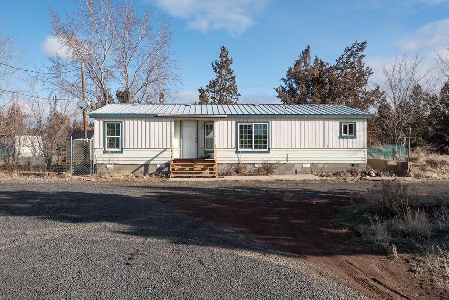 Careful what you ask for! This is a horse owners equestrian dream. 5.15 acres nestled in the picturesque Crooked River Ranch. Includes a 1680 sq. ft. feeder barn and
small horse cover. There are several horse trails within walking distance from the home, leading to BLM property. Also includes a 1460 sq. ft. all purpose building and a
small shed. The home is a 1188 sq. ft. 3 bedroom 2 bath manufactured home, which could use some tlc. The property is within 3.1 miles or 5 minutes from the Crooked
River Ranch/Golf Club, in which the owner can utilize the amenities and events they have to offer.
