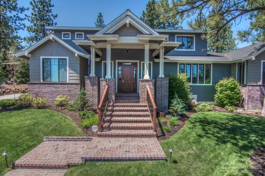 Subtle brick accents compliment this extraordinary estate in Shevlin Ridge. This astounding 4 bed, 4.5 bath, 4215 sqft home features en suites for every bedroom. Spacious & open great room floor plan w/gas fireplace, surround sound, & massive sliding door to bring the outside in. Huge entertainer's gourmet kitchen w/island & eating bar. Private study that could be a 5th bedroom, second level bonus room & 5+ car garage. Outdoor living in a parklike setting w/mature landscaping, gas fireplace & backs to UGB.