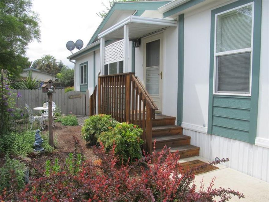 Beautiful 2003 Super Good Cents home with 3 bedrooms, 2 baths and over 1500 sq. ft. of living! This home has a great floor plan and is well suited for entertaining. You will enjoy the large open kitchen with abundant storage, skylight, breakfast nook and newer range/oven and built in microwave. The master suite features an adjoining office or sitting area; bath with dual sinks, soaking tub and oversized shower. Outside features a covered deck and a beautifully landscaped backyard with raised garden beds, shed and a perfect spot to enjoy the views of the creek and bird watch!...Welcome Home