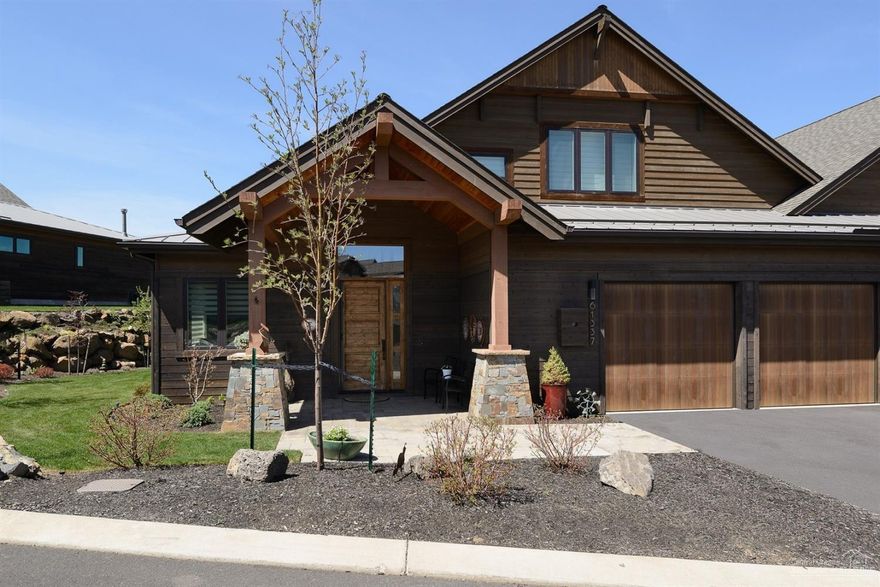 Gorgeous unobstructed mountain and golf course views. Beautifully upgraded Tripleknot townhome in Tetherow, one of Bend's most desirable golf neighborhoods. Vaulted ceilings, fine finishes and abundant natural light. Master retreat and large den on the main floor with 2 suites upstairs. Chef's kitchen with gorgeous cabinetry, double islands, solid surface counters and stainless appliances. Hardwood floors throughout most of the home. Extended paver patios for outdoor entertaining. Abundant built in garage cabinets provide tons of storage. Neighborhood pool, fitness facility, restaurants and 18 hole golf course. Phil's trail and numerous other mountain biking hiking trails at your door. Minutes to downtown Bend and you can be skiing at Mt Bachelor in 20 minutes!