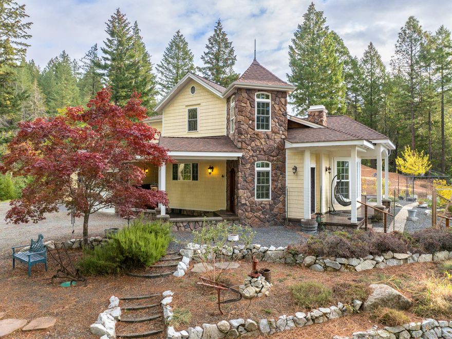 Discover your own private oasis on 10 private acres with this custom 3-bedroom, 2-bath home that offers incredible valley views from the cozy living room complete with gas fireplace for those cold winter nights.  Retreat upstairs to the master suite, complete with a sitting area and a luxurious ensuite bathroom complete with huge tile shower and heated floor.  The second upstairs bedroom and a convenient downstairs guest bedroom and bathroom ensure comfort and flexibility for family or guests. Outdoors, enjoy the tranquil patio with a stunning waterfall, a fenced garden area with raised beds, and a separate finished shop. With plenty of parking, this property combines privacy, luxury, and convenience—perfect for anyone seeking a peaceful getaway!''