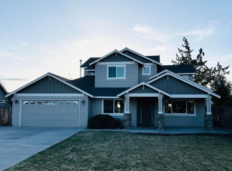 Homes like this don't hit the market often. This home has so much to offer its new owner: enjoy the many beautiful days spending time outside under the covered back patio, the two story playhouse will definitely be a hit, and the Dry Canyon access nearby is the icing on the cake. Make an appointment to see this well maintained 4 bed, 3 bath house on a .21 acre lot in an established and sought after NW Redmond neighborhood. Make this home yours. This home has been recently painted inside and out with nicely updated appliances. The large driveway not only provides additional parking but there is plenty of space to park your RV or other toys.