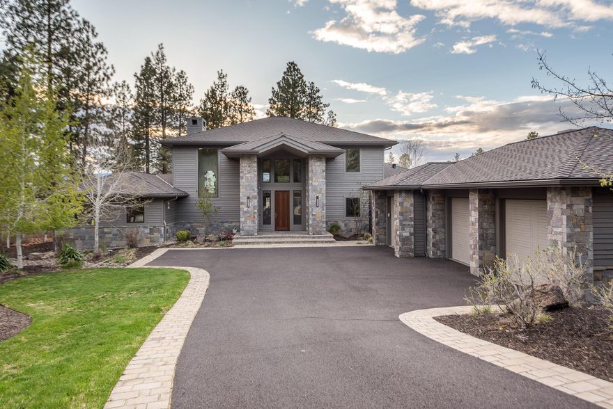 Gorgeous Tetherow home located in a private cul-de-sac with golf course and Cascade Mountain views. Tetherow is one of Bend's most sought after golf communities featuring the renowned David McLay Kidd 18 hole course. Amenities include a fitness center, pool, hot tub and multiple dining options. You will feel at home the minute you enter, the incredible great room's focal feature is a stunning floor to ceiling Rock wall wood-burning fireplace. The chef's kitchen suits the most discerning cook. An abundance of Sapele cabinetry and complimentary quartz countertops. The large island is perfect for entertaining alongside the wet bar. Tasteful wall treatments add a custom touch throughout. Spacious dining area with built ins and mountain views. Main floor primary suite with two walk-in closets, a large soaking tub, double entry shower and dual vanities. Bonus room and office with full bath on the main floor. Two private suites up. The 3 car garage is perfect for storing all your gear!