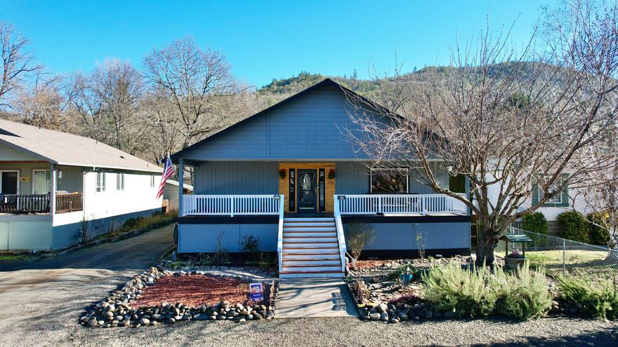 In the heart of Shady Cove within a stones throw away of the mighty Rogue River! Get ready to Cast-A-Line for the salmon or steelhead of your dreams just up the road, or take short ridge to Lost Creek Lake & all the upper Rogue has to offer including endless year-round recreation. This home has it all, including an inviting covered front porch & grand foyer. The spacious open floor plan provides TONS of natural light. Beautiful laminate flooring & built-ins throughout. Bathrooms have been redone to perfection & include heated flooring & more. New interior paint, newer appliances & freshened up cabinets are some of the recent upgrades. Situated just 18-miles from Rogue Valley International Airport, this almost ¼-acre lot features a flat fenced backyard & low maintenance landscaping, all ready for you to entertain & park all your toys. The attached oversized 2-car garage features plenty of room for your things plus has a great shop area for your projects along with TONS of storage.