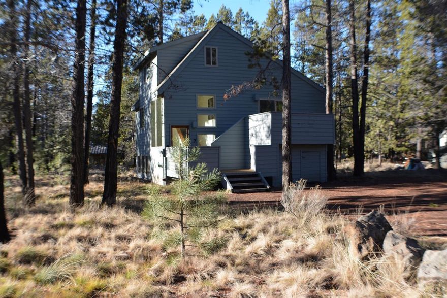 Location, Location, Location. This home is located close to the Big Deschutes River access. 3 bedrooms, 2 bathrooms, over 1650 sq. ft of living space. This home has been updated in the last 3 years. Newer roof, interior paint, hardwood floors, carpet and windows. Come see what Sunriver has to offer. SHARC has been paid in full.