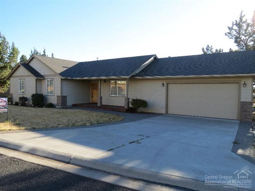 Beautiful single level home in SW Redmond's Valleyview addition. 3 large bedrooms or 2 and a den, this home has quality to show. Open living, dining, kitchen area with vaulted ceiling, very light, bright and spacious, warm fireplace for those cold nights. Spacious kitchen with eating bar and tile backsplash, has nook for morning coffee. Large master bedroom with walk-in closet, double sinks and a huge walk-in shower. Forced air gas with AC this home has great curb appeal and includes a double car garage.