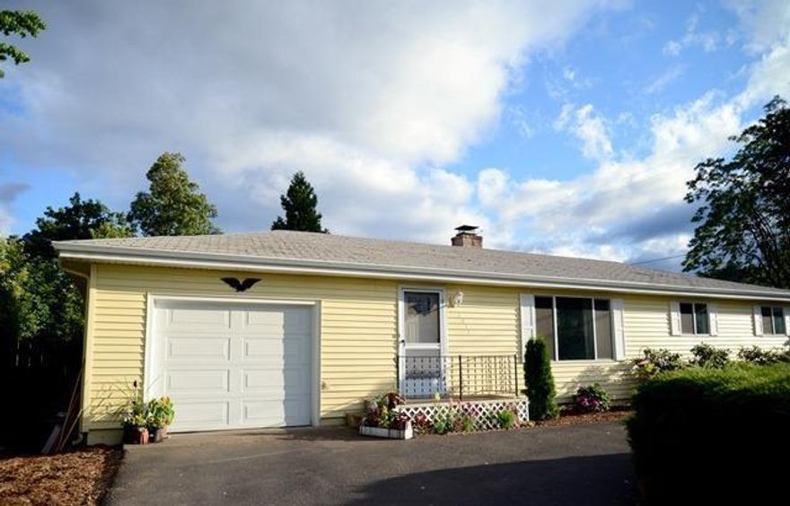 Country feel with close in convenience! Motivated seller for this solid, vintage ranch home that was recently updated with custom hardwood in the living room, slate tile, remodeled kitchen and updated bath. All bedrooms have original hardwood floors, there's dual-pane vinyl windows, newer appliances including water heater, newer heat pump, and ducting. Nice large .57 acre lot, fenced backyard and circular driveway with room in back for a large shop or RV parking. Located in the Griffin Creek Elementary School District.