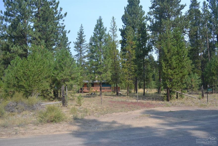Great little cabin in the woods on nearly an acre just minutes from the town of La Pine. Close to high lakes, Sunriver Resort, Mt Bachelor and all that Central Oregon has to offer. This is a great opportunity to own a getaway/2nd home. Home features one bedroom, one bath and a beautiful brick fireplace and a large deck with a built in BBQ pit. Come and enjoy the peace and quiet of Central Oregon. Seller just installed a new well and septic tank in April 2016.