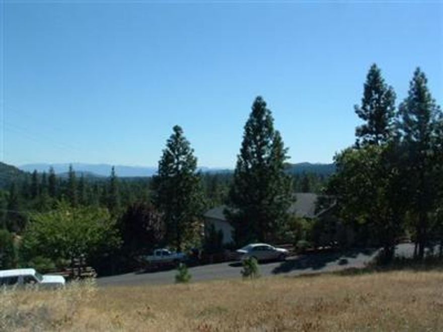 Beautiful view and over one-half acre. (.52) Close to downtown Shady Cove.