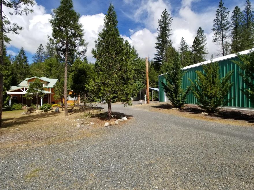 Back on the Market Through No Fault of the Property ...Just imagine sitting in your favorite chair watching the beautiful Pleasant creek flow by or take a swim in the two large swimming holes. Totally secluded, no neighbors in site. not far from the town of Rogue River and I-5. Newer Huge 40x60 Insulated shop to play in. Sit out side on the deck and enjoy the sounds of nature. This is a gem of a property. Need to see it and feel everything it has to offer. RV parking with power and Etc. Heated green house for garden enthusiasts. Two tax lots, back parcel has non expiring home site. Septic and well flow testing done. New Metal Roof,2 Rooms will need closets. Price to sell.