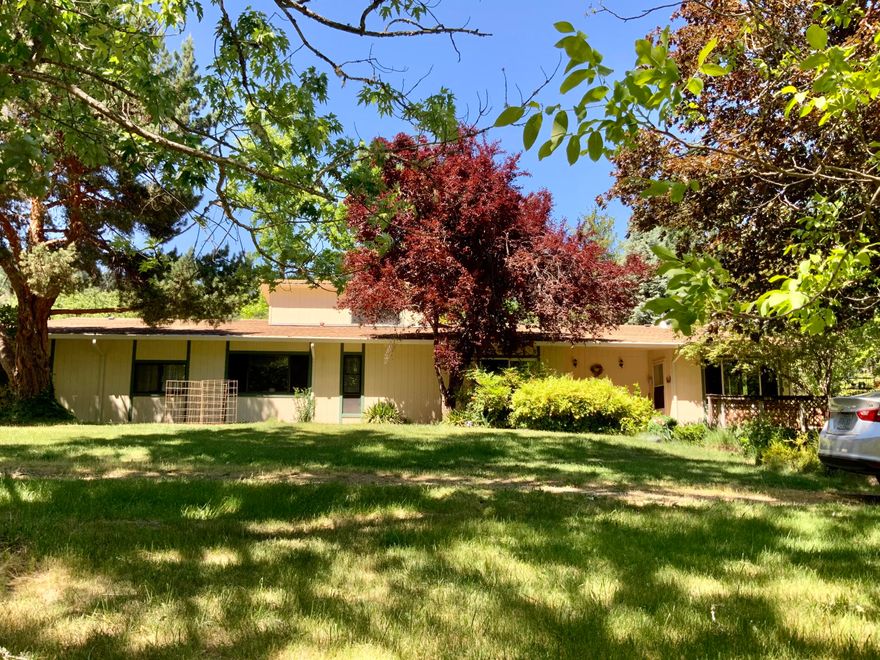 Back on the market at no fault of the property! This property offers a unique sense of country living and privacy. This open floor plan ranch style home has 1902 SqFt, with two bedrooms and a loft that can be used as another bedroom-living or office space, large windows that let in a ton of natural light, newer roofer (2016), new water heater, updated siding on the home, lots of additional storage, tongue and groove pine vaulted ceilings, attached garage AND detached shop/farm shed. Well has been tested at 28 GPM and septic has been recently pumped. The property is 22.46 level, usable acres, zoned Exclusive Farm Use (EFU) with 5 seasonal creeks and a pond with lots of water.  Plenty of space to grow commercially or for personal use, fenced in garden area for flowers and vegetables. Seller providing a one year First American Home Warranty with the sale. See attached map pack for property line information. Don't miss this property!