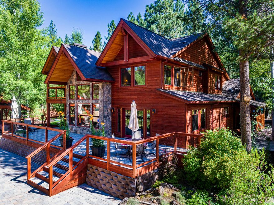 Looking for your oasis? This stunning custom home sits amongst mature trees and detailed landscaping. Enjoy entertaining in the outdoor kitchen area while listening to the Deschutes River. Relaxation at its best! No corners were cut on the details of this home. High quality windows, large wood beams, imported fixtures, hardwood floors, knotty alder cabinets and trim, Montana moss stone accents, Thermador appliances, ample storage and a beautiful one of a kind front door custom made out of 100 year old fir that welcomes you in. The master suite includes a fireplace, massive walk in closet, double multi head shower units, separate toilet room with bidet and an attached bonus room. 
Wild River neighborhood offers private river access, maintained roads, trails along the river and close to lakes, skiing and so much more. One of a kind property, must see this home that is located in a hidden gem of Central Oregon.