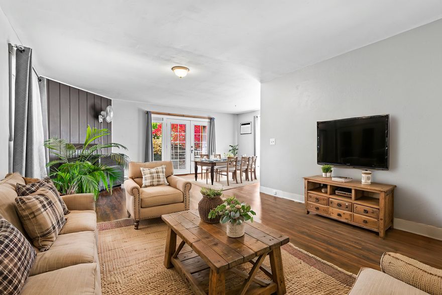 Generous lot on a quiet, tree-lined cul-de-sac! Mature landscaping surrounds the fully fenced front yard, with a cute paver patio for a peaceful place to relax. Broad French doors bring the indoor and outdoor living space together, allowing fresh air and tons of light to flow into the open-concept living and dining space. The home has a functional floor plan with a fully remodeled guest bathroom just off the living room, and an oversized bedroom, a guest bedroom and second full bathroom privately located on the north half of the house. The charming galley kitchen features some newer stainless steel appliances, with a large pantry with extra storage and a separate laundry room with a utility sink leading to the backyard. A wide driveway and oversized carport provide plenty of parking, with an attached workshop with power and shed for extra storage. The backyard and garden are serviced by GPID irrigation, all being watched over by a brilliant redwood tree.