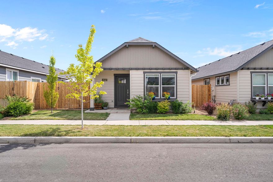 This charming single-level townhome offers a smart, efficient layout with plenty of style. The granite kitchen features generous counter space, a large pantry, and a breakfast bar. The entry leads into a warm and welcoming living area with great flow throughout the home. The primary suite includes a spacious closet and private bath, while two additional bedrooms offer flexibility for guests, a home office, or den. A separate laundry room adds storage and convenience. The attached garage, which includes built-in shelving, is the only shared wall, providing added privacy. Outside, the fully fenced, low-maintenance yard offers a perfect space to relax, garden, or play. A must see!