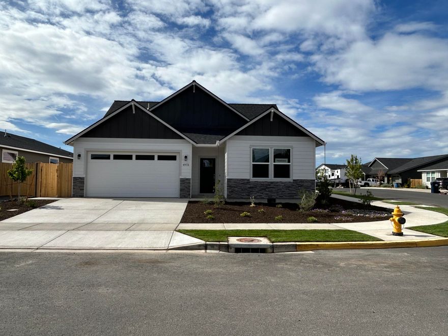 Built-in ADU! Under construction- est. completion mid July. Lot 31 features the Parker floorplan w/ 1,572 sf main living w/ 3 bdrms, 2 full baths and attached ADU w/ 660 sf. Upgraded features include A/C, quartz counters, full tile backsplash, fenced backyard w/ landscaping & sprinklers. Entertain in your kitchen w/ SS appliances, walk-in pantry, full height tiled backsplash, soft-close cabinets opening to dining area & great room w/ decorative fireplace. Durable laminate plank flooring thru-out w/ carpeted bdrms. *Rendering & floorplan subject to change. Main home natural gas. ADU electric.