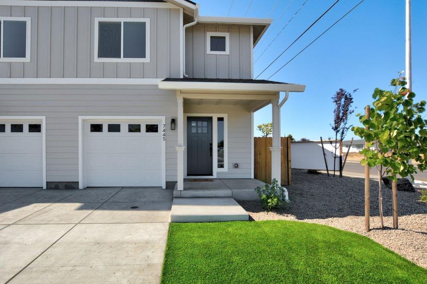 This gorgeous new construction 3-bedroom, 2.5-bath townhome offers modern luxury with thoughtful details throughout.  The main floor features sleek LVP flooring, while plush carpet in the upstairs bedrooms adds comfort. The gourmet kitchen is equipped with stainless steel appliances, granite countertops, custom tile backsplash, & custom wooden cabinetry. All three spacious bedrooms are located upstairs, providing privacy & quiet. Add peace of mind to this home as it has a complete fire sprinkler system!  The home also includes a private patio for outdoor relaxation, an attached finished single-car garage with garage door opener, off street parking, and a beautifully landscaped front yard with low-maintenance artificial grass & fully landscaped & fenced backyard with inground sprinklers.  This home blends style, comfort, & convenience in a prime location with easy access to local amenities including, shopping, grocery, theater, and dining.  Call today to schedule your appointment!