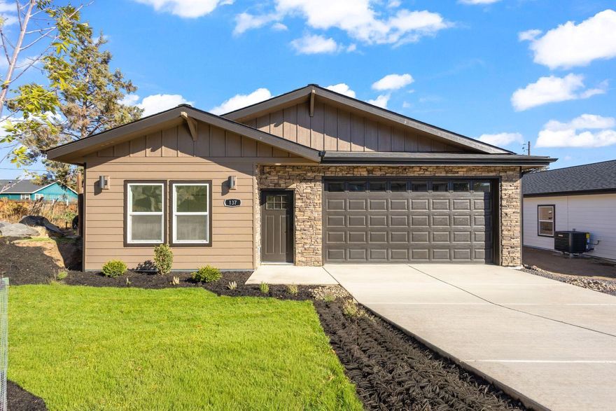 Step inside this beautifully designed 3-bed, 2-bath custom home offering 1,496 sq ft of thoughtful craftsmanship and modern comfort. Featuring 9 ft ceilings, graceful arch details throughout, this home blends charm with function at every turn. The open-concept layout highlights luxury vinyl plank flooring, skylights with solar shades, and a stunning kitchen with floor-to-ceiling cabinetry, quartz counters, soft-close drawers, and a large island perfect for gatherings. The spacious primary suite offers abundant storage and a sliding glass door leading to a huge covered back porch - ideal for relaxing or entertaining. Enjoy the convenience of a dedicated laundry room with upper cabinets and a utility sink, plus an oversized 8-ft garage door, side man door, and alley access. With central A/C, forced-air heating, and meticulous attention to detail, this
home delivers exceptional quality, comfort, and value throughout.