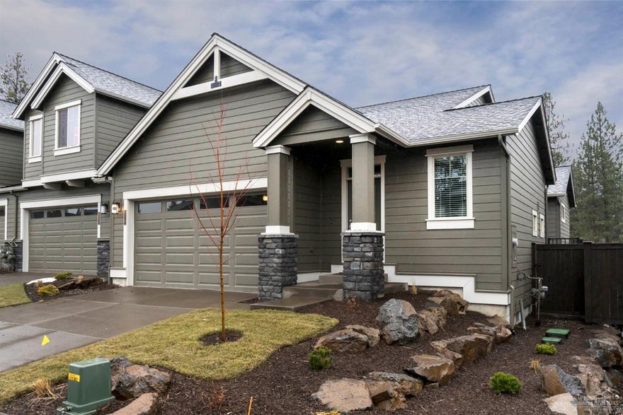 Popular Lodgepole plan by Pahlisch. Brand new and fully loaded. Washer/dryer, refrigerator and blinds all installed and included. Enjoy this 1 level town home with private entry, upgraded laminate in guest bath and hall, open kitchen, quartz counters, stainless appliances and built in desk area. Fully fenced yard and lovely deck area off great room. Easy walk to pool area and neighborhood trails. 2 car garage. Home is still under warranty.
