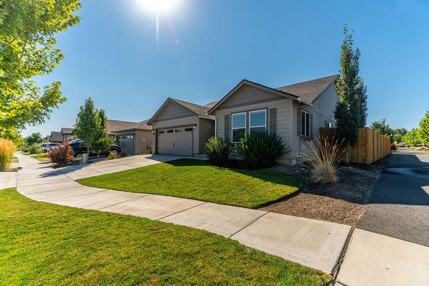 From the moment you enter this immaculately maintained single level home situated on a corner lot, your eye will be drawn to the thoughtful design details to be found at every turn. From the spacious gallery entry to the wide plank LVP flooring and updated light fixtures, this home feels like something out of a magazine. The hub of the house is the vaulted great room, directly connected to a large covered patio and fully fenced back yard that backs to a private pocket park. The well designed kitchen includes a large center island with bar seating, quartz counters, plentiful cabinetry and a pantry. Enjoy the generously proportioned primary suite with dual walk-in closets plus bath with dual vanity and penny tile floors. Nicely separated from the primary suite are two additional guest rooms and a full bath. This home enjoys a private, peaceful location just blocks away from the larger Hayden Park and local schools. Put this one at the top of your list. It won't last long!