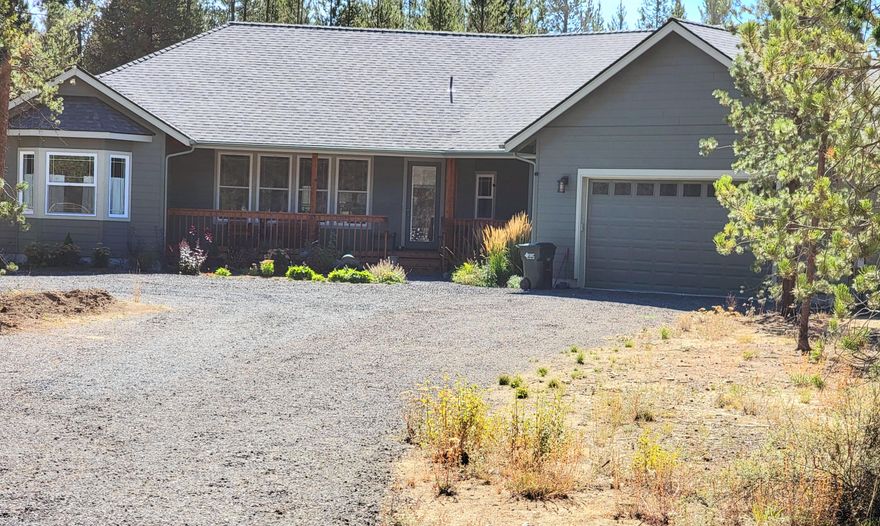 Custom built in 2019 this beautiful 3 bedroom home has a ''Jack & Jill'' set up between the two guest bedrooms.  One guest bedroom has bay window.  Great room separates the master from the guest bedrooms.  Kitchen is spacious with island with great storage. Pantry gives you room for costco shopping. Laundry room has nook for additional freezer or refrigerator. Master bath features separate shower and tub. Granite throughout all bathrooms and kitchen.  Sunroom is located off the living room and gives beautiful additional space. This property is fully fenced (cross fenced too) and gated. Garage is oversize with workshop area. Sellers are in process of packing and new photos will be uploaded upon their moving out.