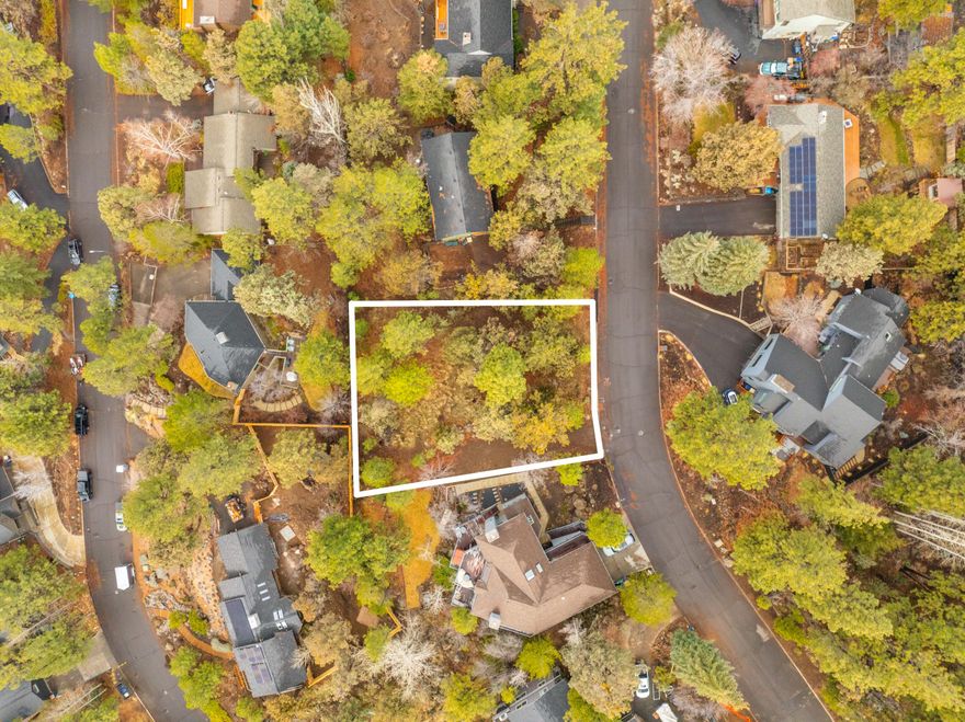 Nestled in the picturesque West Hills of Bend, Oregon, this homesite offers a stunning backdrop for crafting your dream custom home. The property is primed for construction, presenting a blank slate for buyers to realize their unique vision. Utilities are conveniently accessible at the street. The lot's south-facing orientation not only provides glimpses of Mt. Bachelor but also opens up possibilities for passive solar design, depending on the chosen layout. This is a rare chance to secure a south-facing lot in one of Bend's most sought-after neighborhoods, where vacant parcels are increasingly scarce.