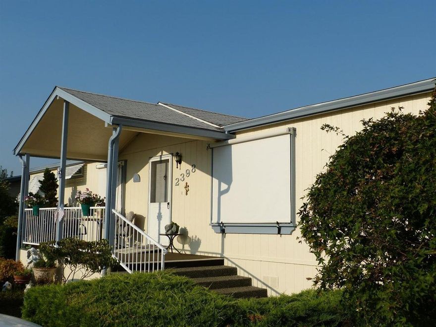 Very sweet 1998 manufactured home that has been lovingly cared for.   Spacious rooms, vaulted ceilings, large carport and shed, split floorplan.   
Very lovely scenic murals but if you don't like them seller can issue credit to remove.  
Step in shower with benches in primary ensuite and huge closet.  
One of most popular senior parks in area because it is so well kept and affordable, $675 rent includes great well water.  Brand new roof.    Willow Estates is family owned and they take pride in having park look its best.